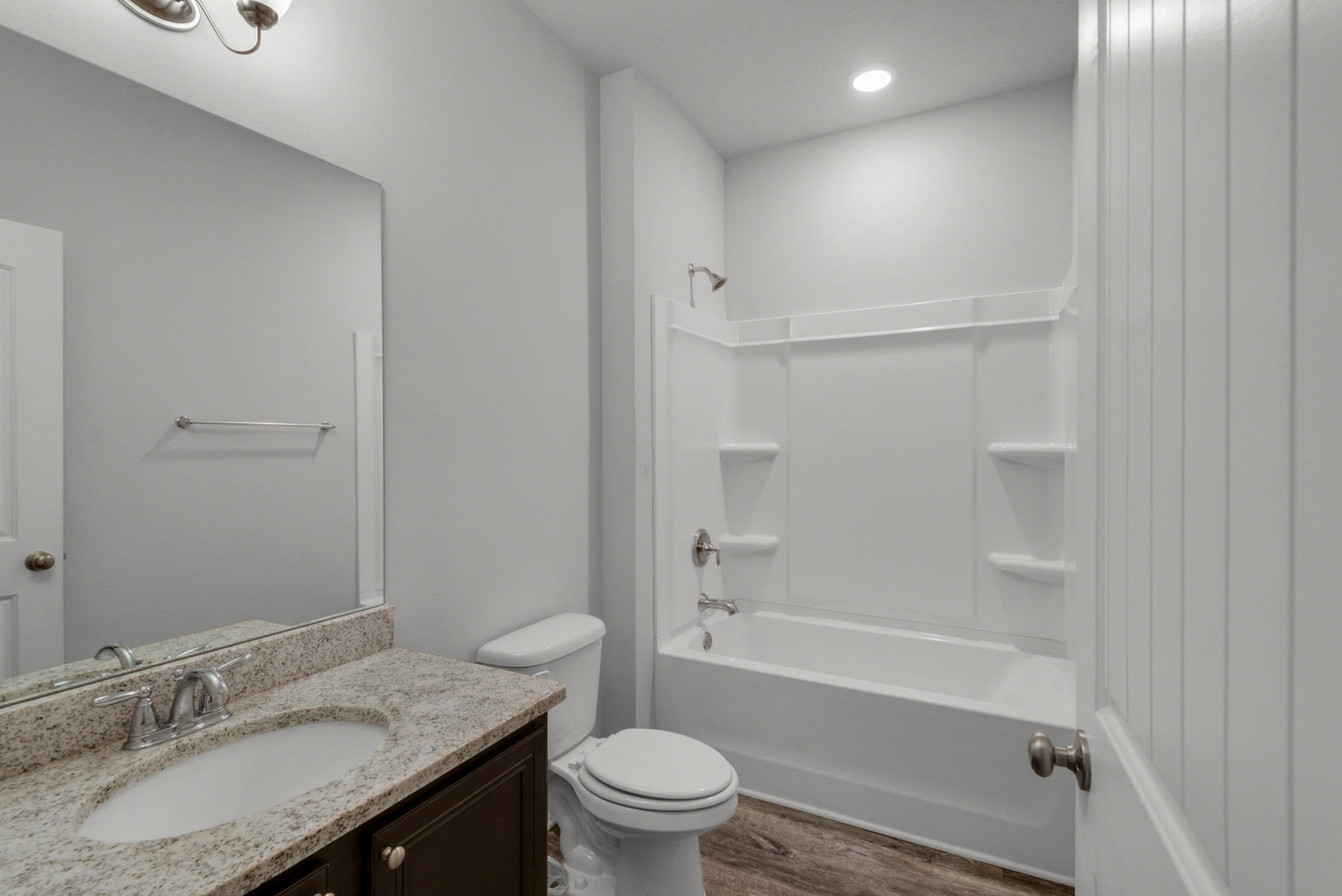 214 Southern Pines Road Santa Rosa Beach, FL 32459 - Photo 22 of 27 a bathroom with a granite countertop sink toilet and shower