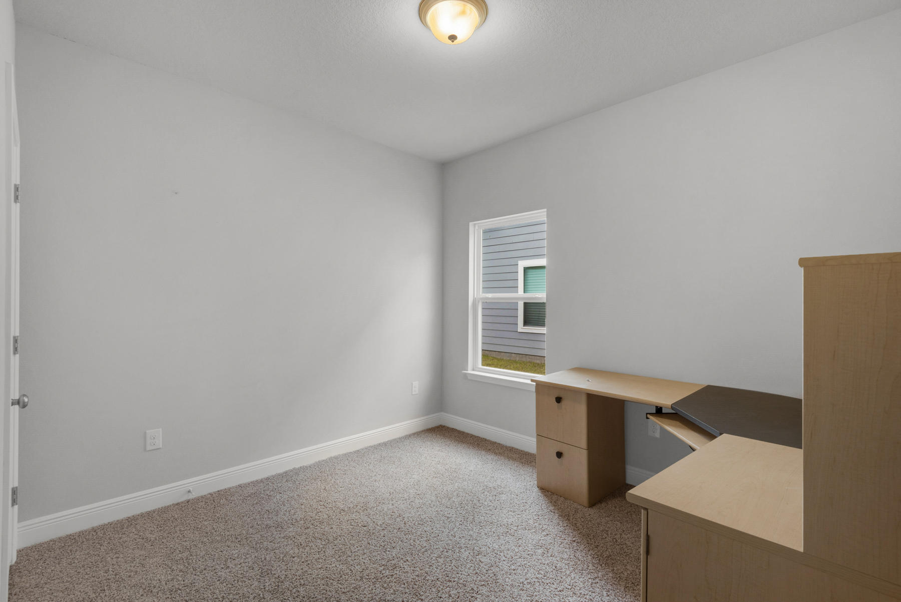 214 Southern Pines Road Santa Rosa Beach, FL 32459 - Photo 24 of 27 an empty room with windows