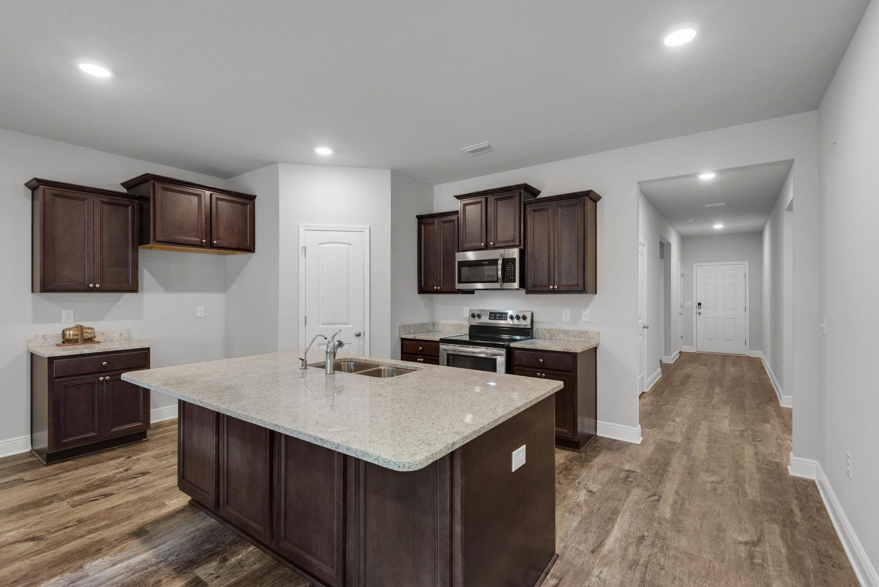214 Southern Pines Road Santa Rosa Beach, FL 32459 - Photo 7 of 27 a kitchen with a sink and steel appliances