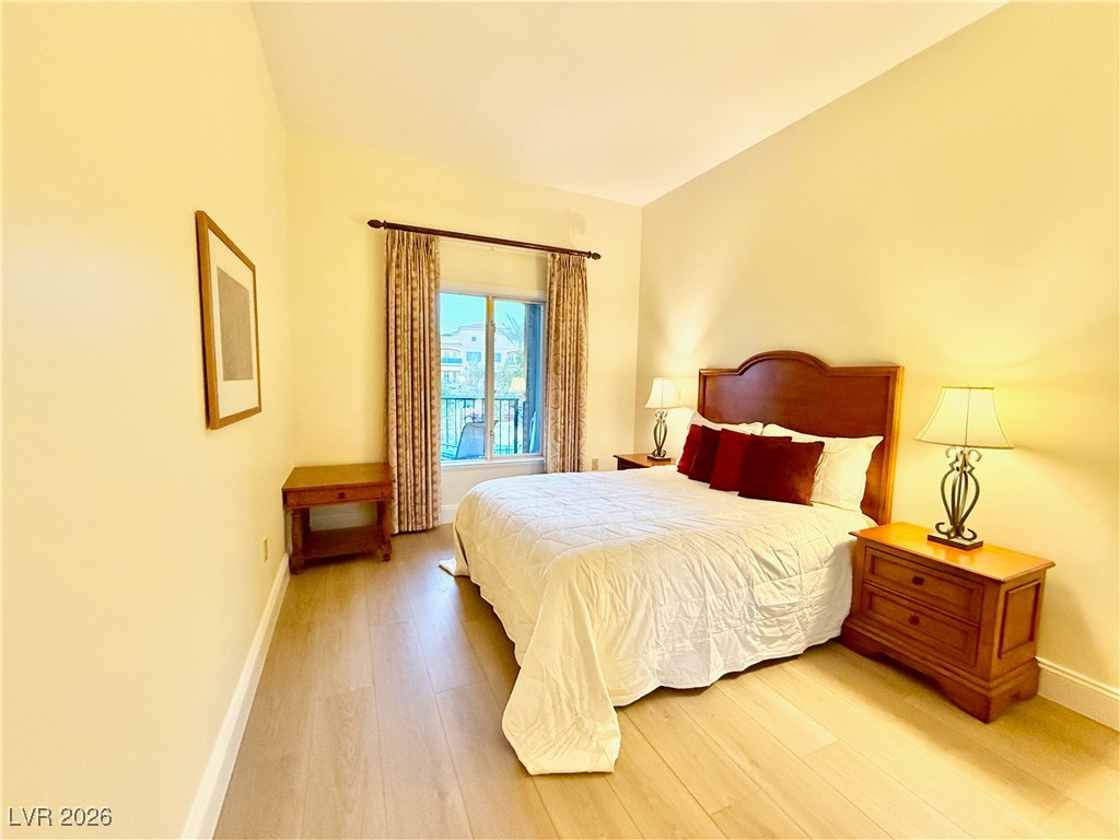 30 Strada Di Villaggio, Unit 204 Henderson, NV 89011 - Photo 32 of 59 Secondary Bedroom w/Queen Bed