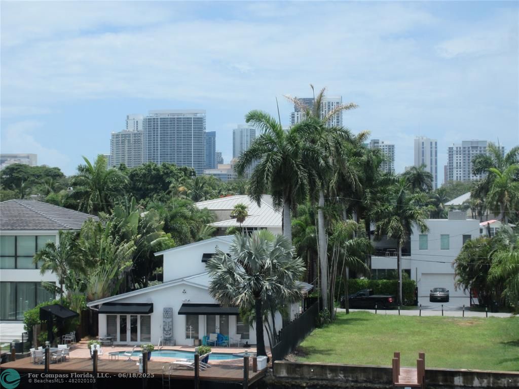 45 Hendricks Isle, Unit 301 Fort Lauderdale, FL 33301 - Photo 13 of 26 a view of a city with tall buildings and a big yard