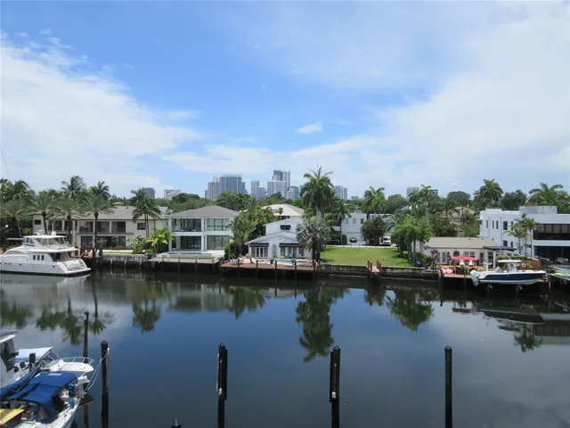 a view of a balcony with trees