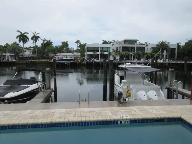 swimming pool view with a outdoor seating space