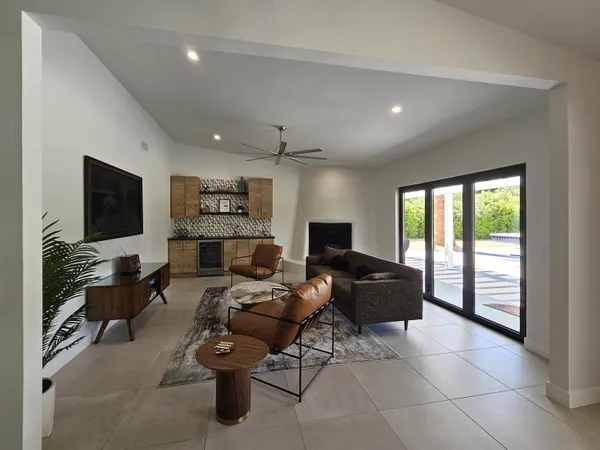 a bathroom with a shower and a sink