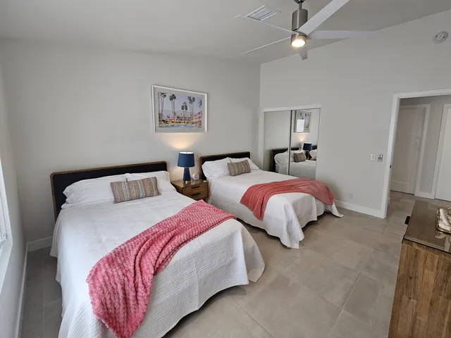 a view of a swimming pool with an outdoor space and seating