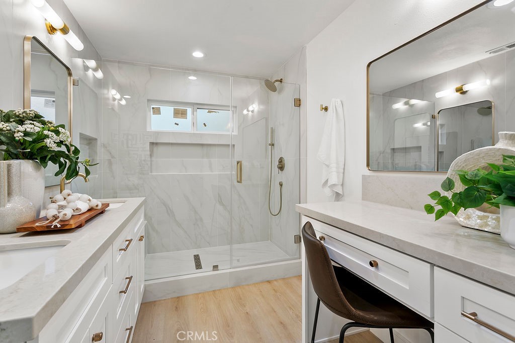 6091 Navajo Road Westminster, CA 92683 - Photo 12 of 44 Main House- Primary Ensuite Bathroom w/ makeup vanity