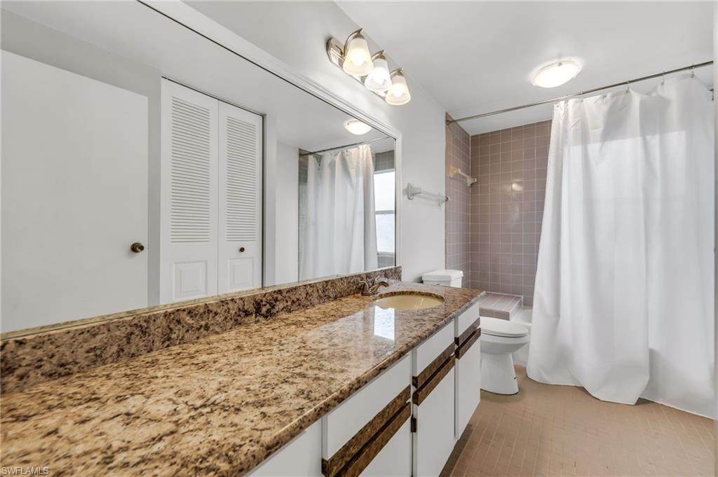 225 Pebble Beach Circle Naples, FL 34113 - Photo 13 of 16 Guest Bathroom