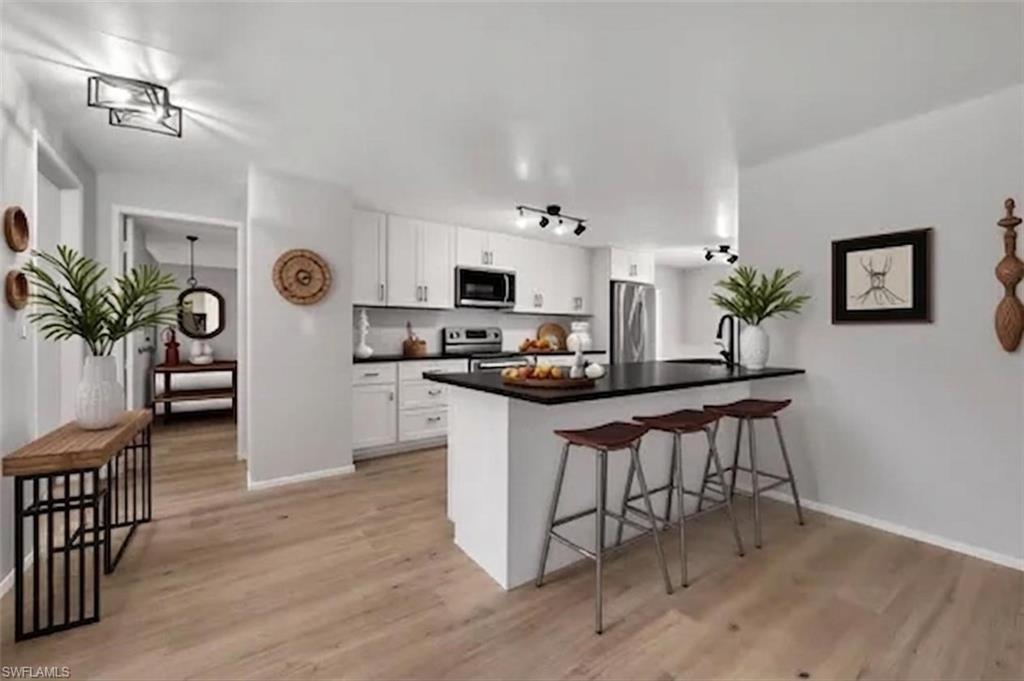 225 Pebble Beach Circle Naples, FL 34113 - Photo 6 of 16 Open Kitchen