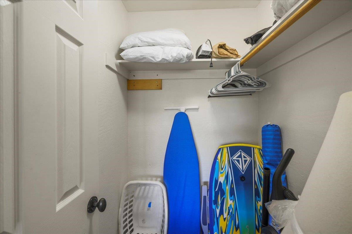 4909 Lower Honoapiilani Road, Unit E2E Lahaina, HI 96761 - Photo 22 of 42 a view of walk in closet with clothes