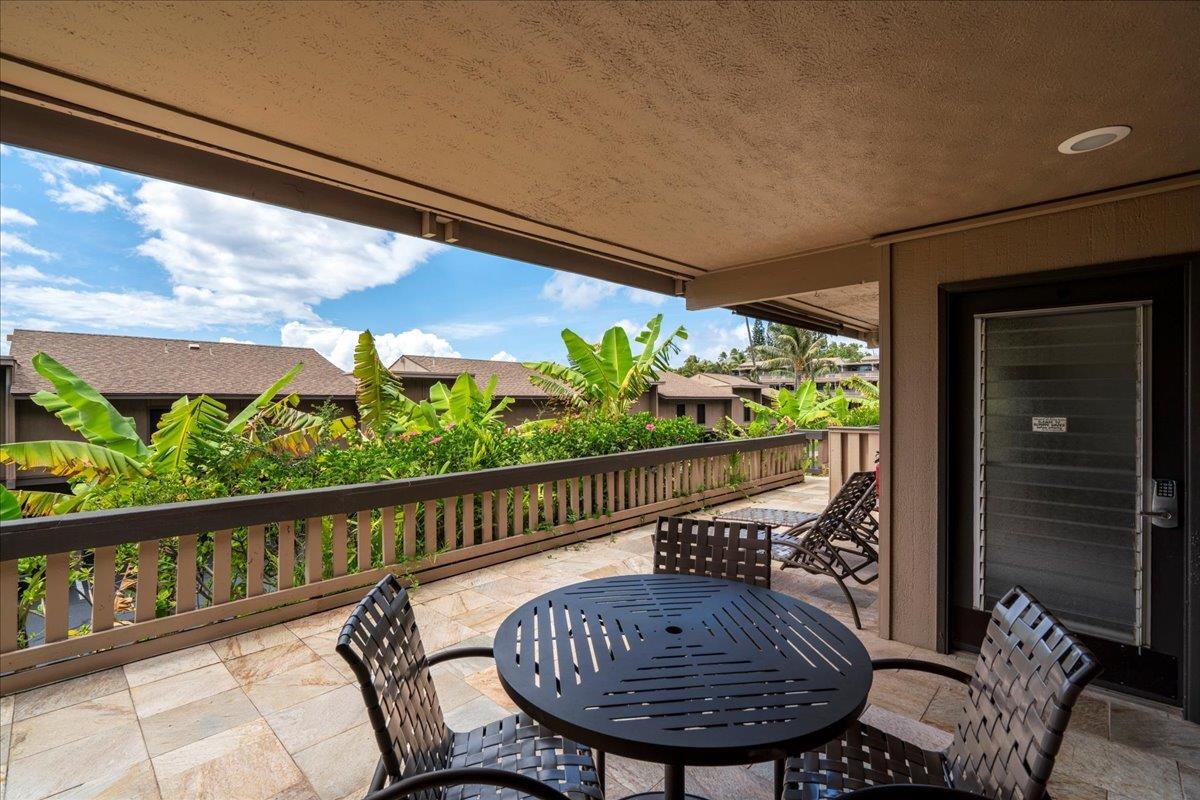 4909 Lower Honoapiilani Road, Unit E2E Lahaina, HI 96761 - Photo 26 of 42 a view of a porch with furniture