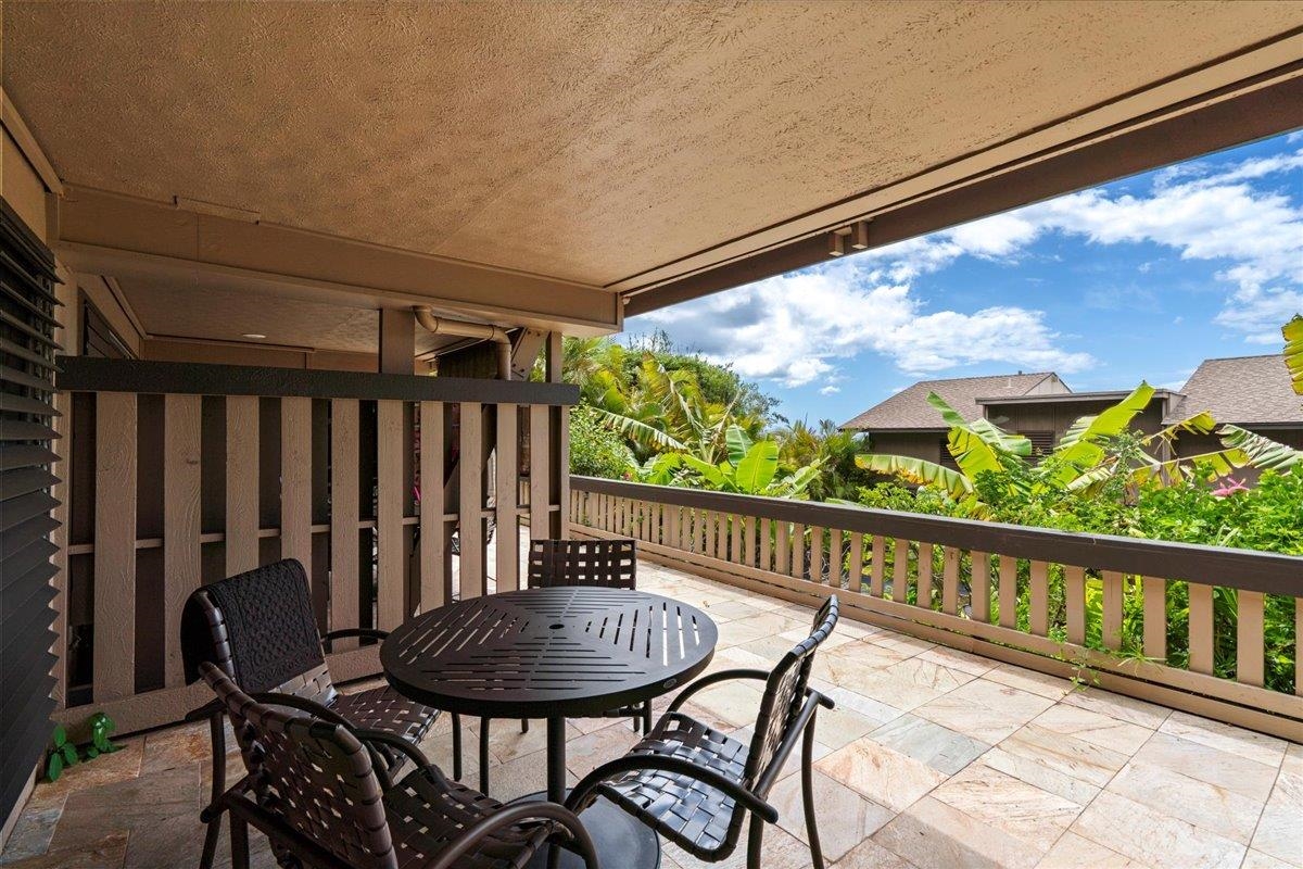 4909 Lower Honoapiilani Road, Unit E2E Lahaina, HI 96761 - Photo 27 of 42 a view of a chairs and table in the balcony