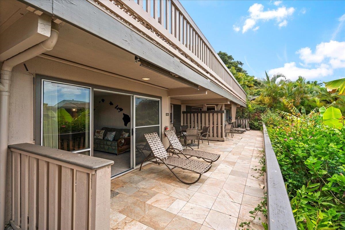 4909 Lower Honoapiilani Road, Unit E2E Lahaina, HI 96761 - Photo 6 of 42 a view of two chairs and table in the balcony