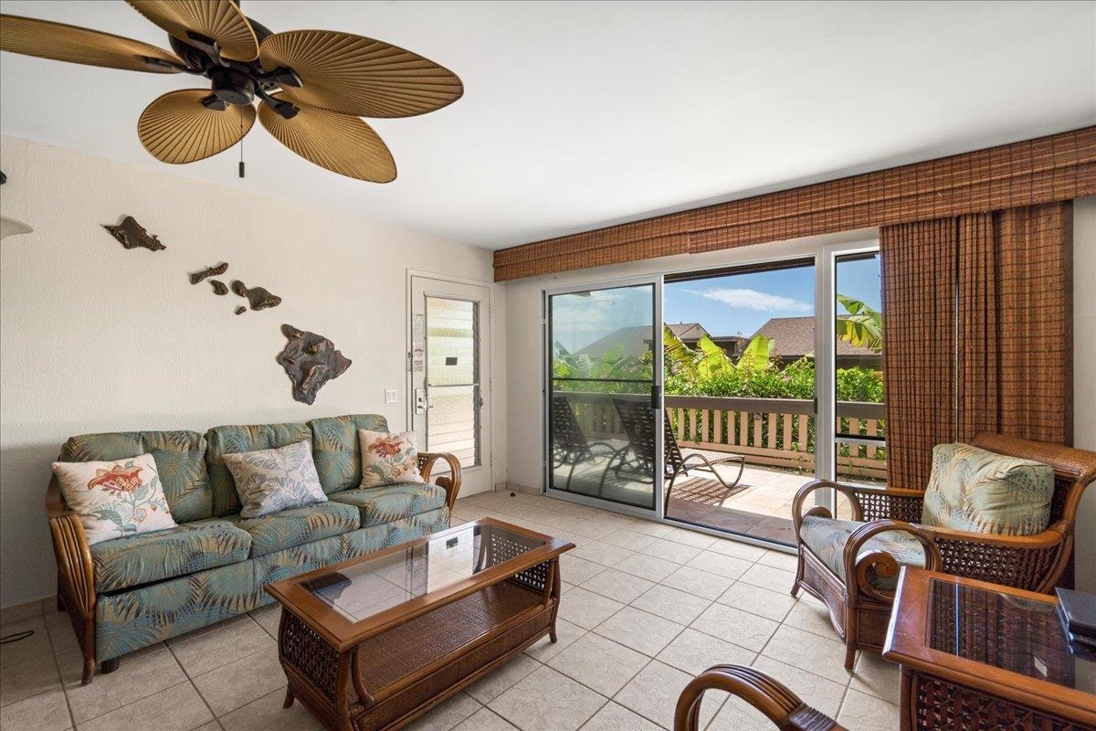 4909 Lower Honoapiilani Road, Unit E2E Lahaina, HI 96761 - Photo 8 of 42 a living room with furniture and a large window