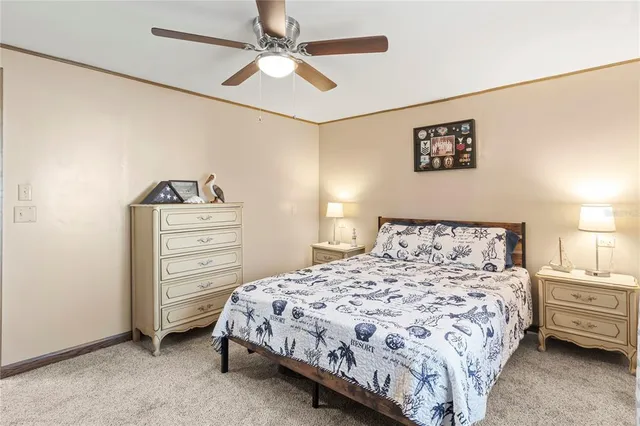 a bedroom with a bed and a table in it