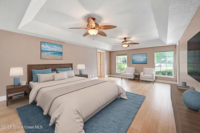 a view of kitchen with kitchen island microwave and stove