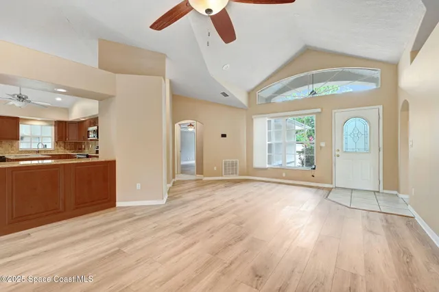 a view of an empty room and window