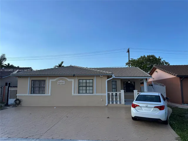 a car parked in front of house