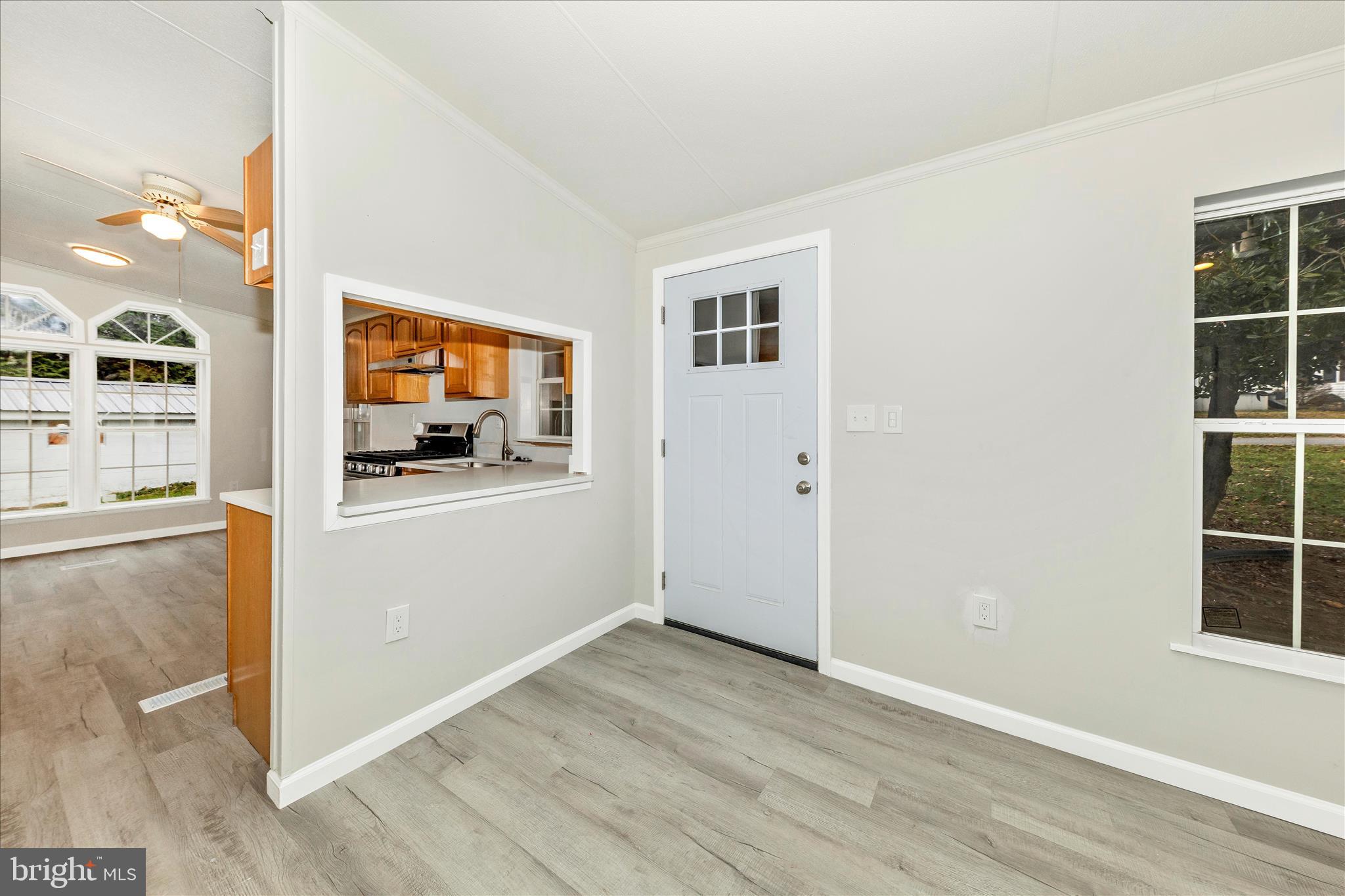 2311 Back Road Sharpsburg, MD 21782 - Photo 2 of 36 an empty room with wooden floor and windows