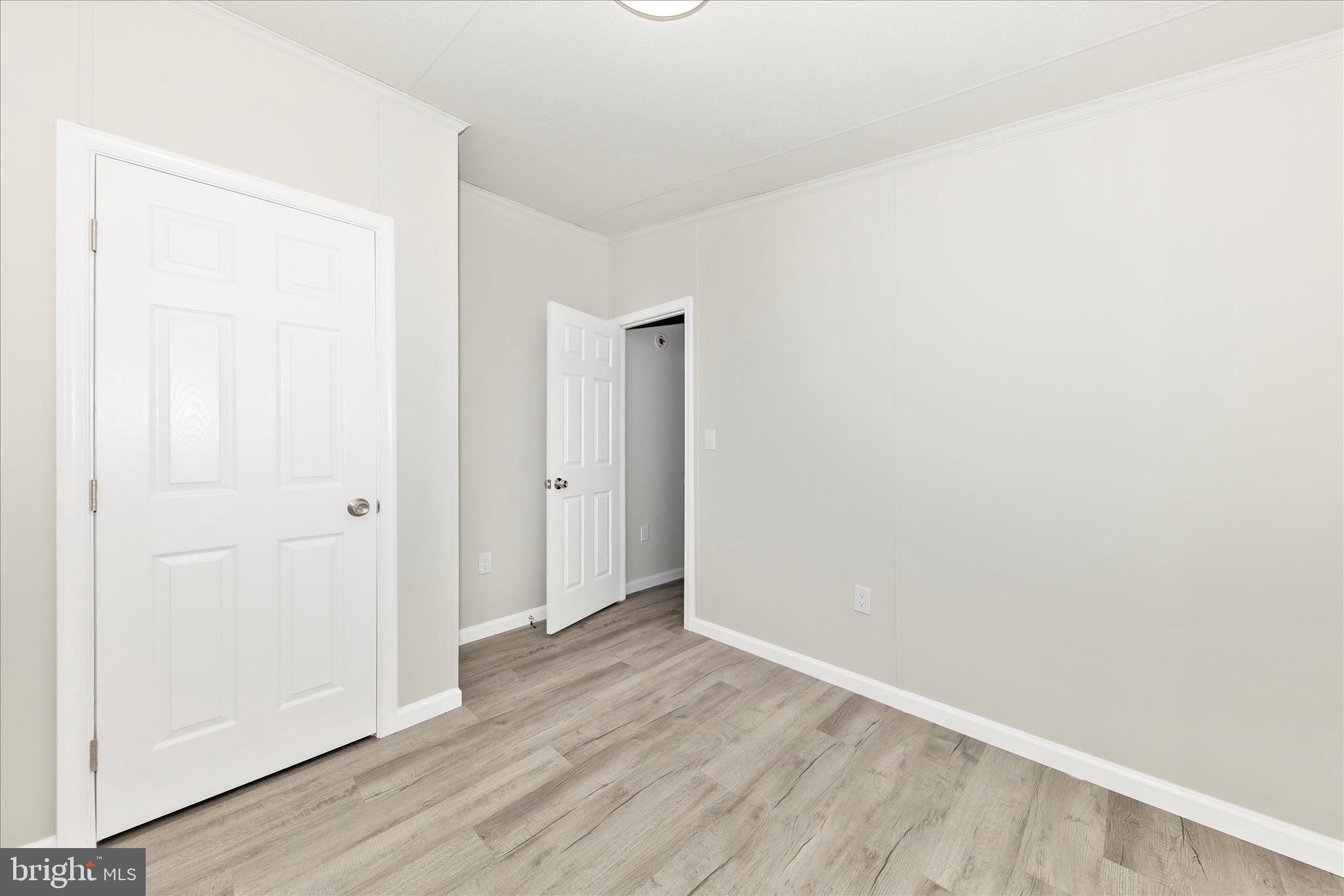 2311 Back Road Sharpsburg, MD 21782 - Photo 28 of 36 a view of an empty room with wooden floor