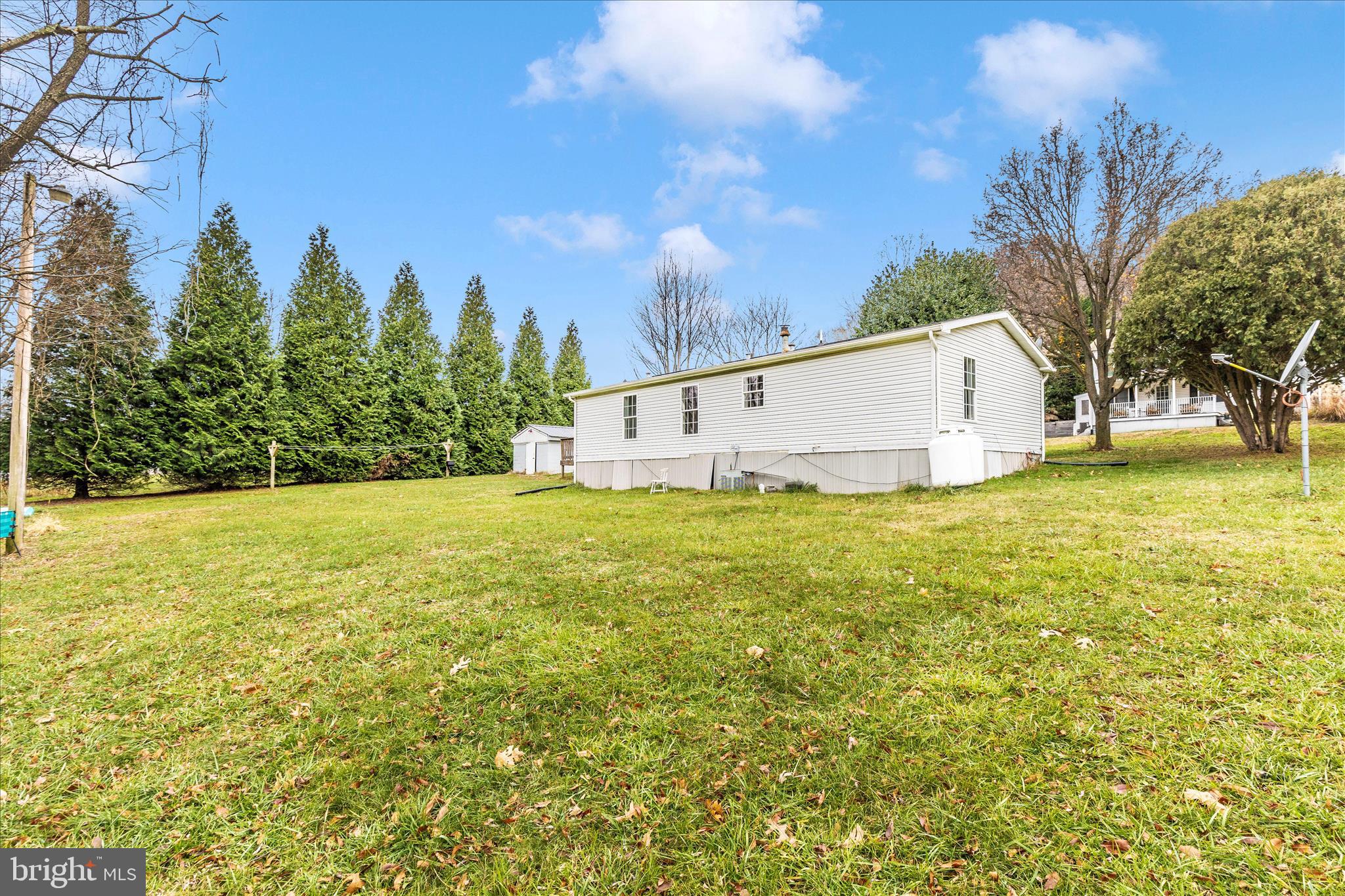 2311 Back Road Sharpsburg, MD 21782 - Photo 32 of 36 a view of a swimming pool with an outdoor space and seating area