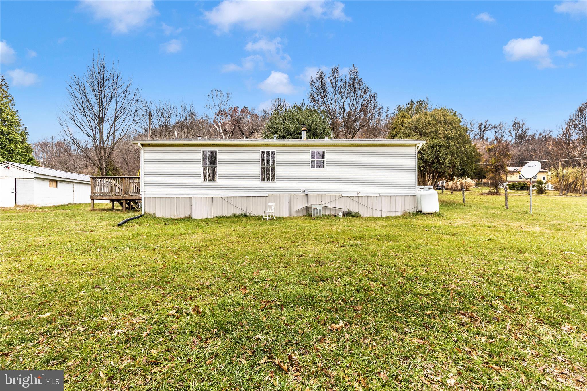 2311 Back Road Sharpsburg, MD 21782 - Photo 33 of 36 a view of a swimming pool with an outdoor space and seating area