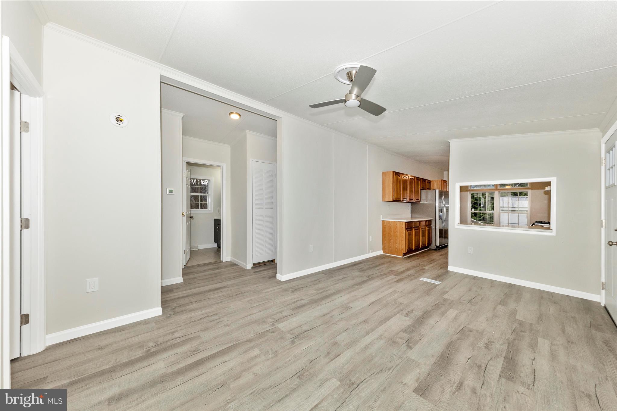 2311 Back Road Sharpsburg, MD 21782 - Photo 7 of 36 a view of empty room with wooden floor and window