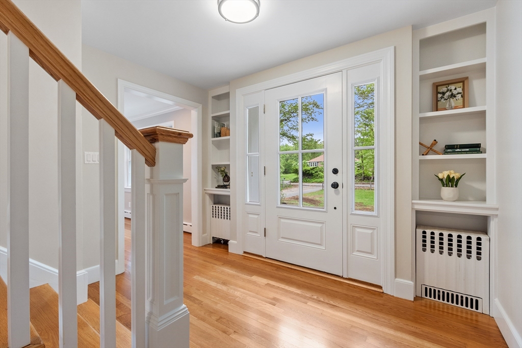 254 Taylor Road Stow, MA 01775 - Photo 13 of 42 a view of livingroom with furniture and front door