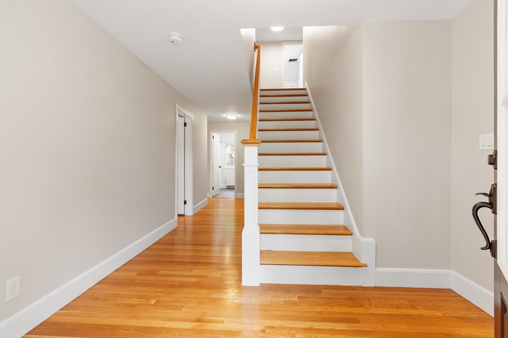 254 Taylor Road Stow, MA 01775 - Photo 23 of 42 a view of entryway with wooden floor