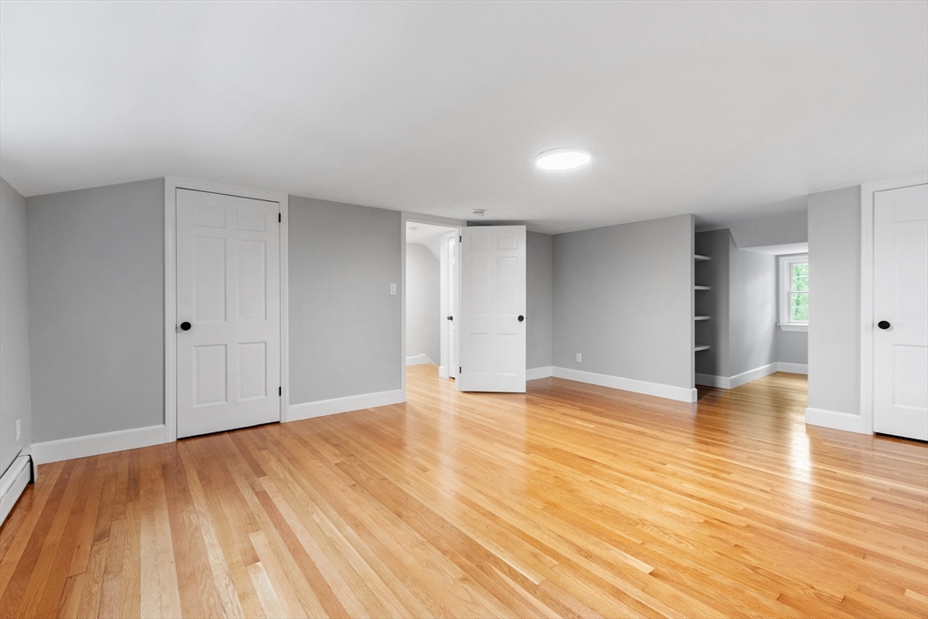 254 Taylor Road Stow, MA 01775 - Photo 32 of 42 a view of empty room with wooden floor