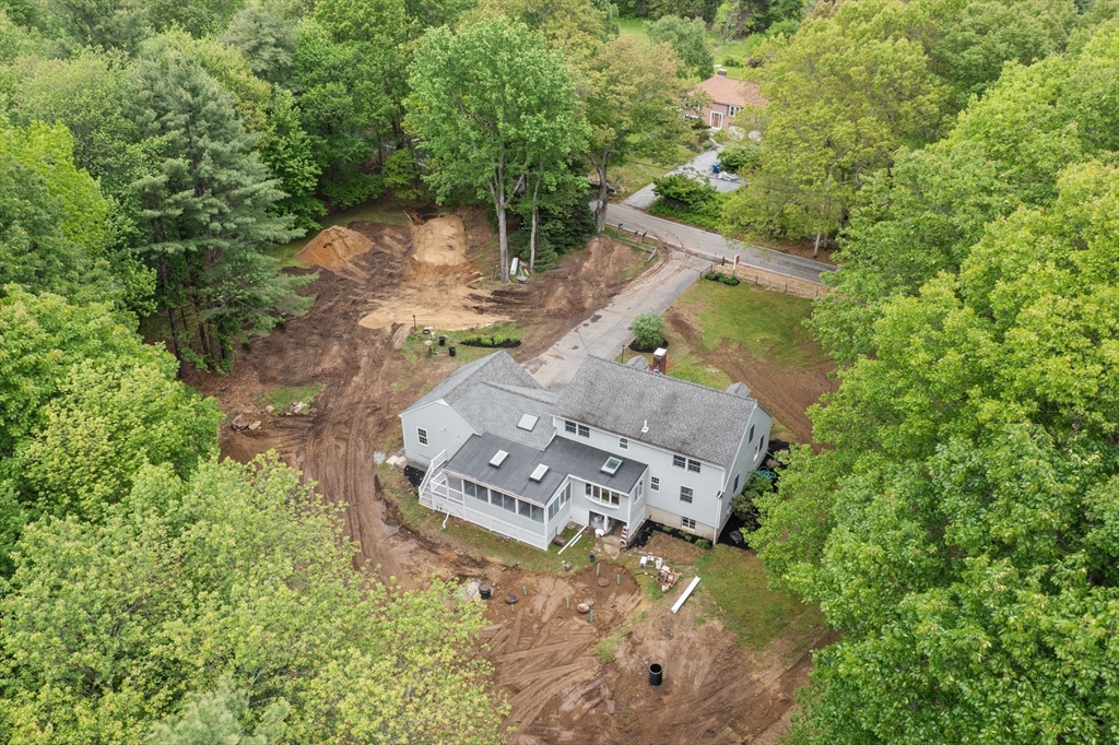 254 Taylor Road Stow, MA 01775 - Photo 4 of 42 an aerial view of a house with a yard