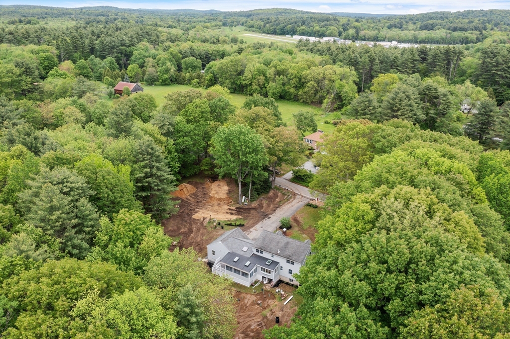 254 Taylor Road Stow, MA 01775 - Photo 5 of 42 an aerial view of a house with a yard