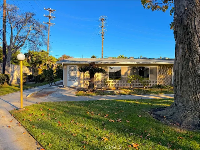 a view of a house with swimming pool