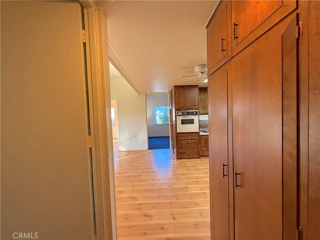 a view of a kitchen from the hallway