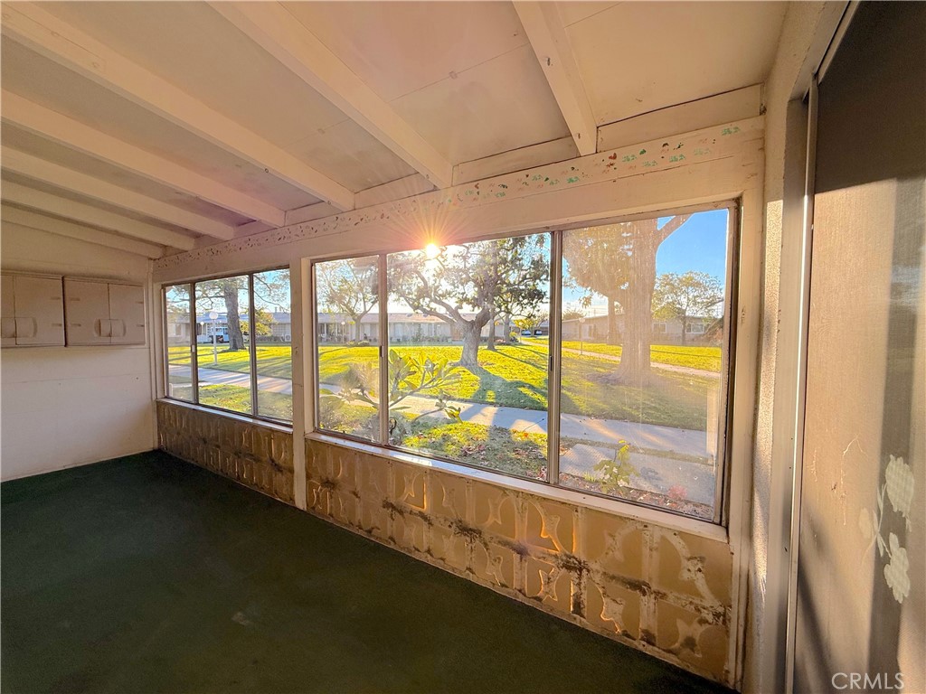 1240 Scioto Road, Unit 228F Seal Beach, CA 90740 - Photo 31 of 38 a view of an empty room with a large window