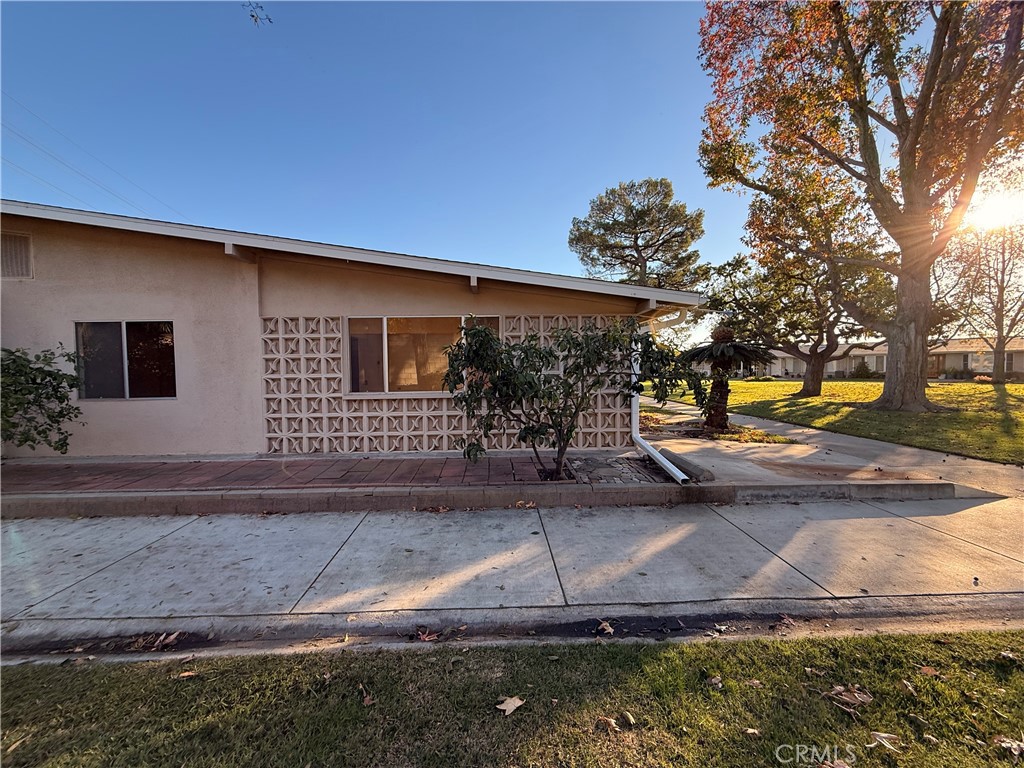 1240 Scioto Road, Unit 228F Seal Beach, CA 90740 - Photo 37 of 38 a front view of a house with garden