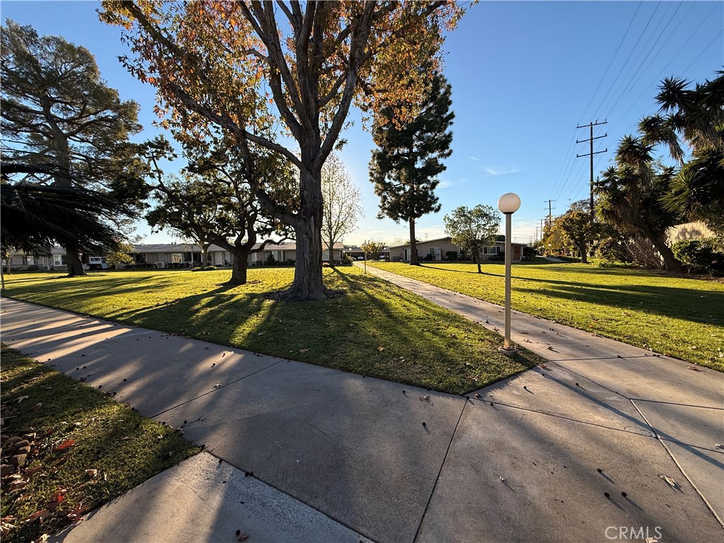 1240 Scioto Road, Unit 228F Seal Beach, CA 90740 - Photo 38 of 38 a view of a yard with swimming pool and sitting space
