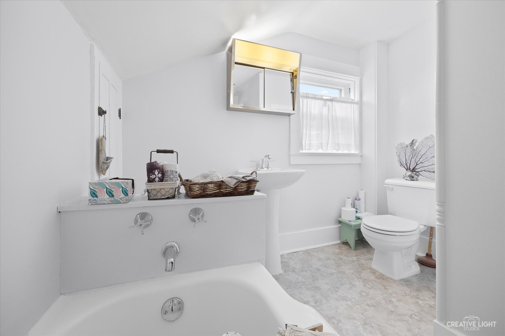 41-w684 Russell Road Elgin, IL 60124 - Photo 11 of 17 a bathroom with a sink and a toilet