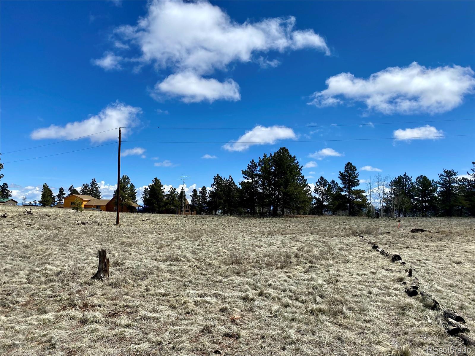 0 Oahu Road Hartsel, CO 80449 - Photo 22 of 47 a view of a pathway with a building in the background