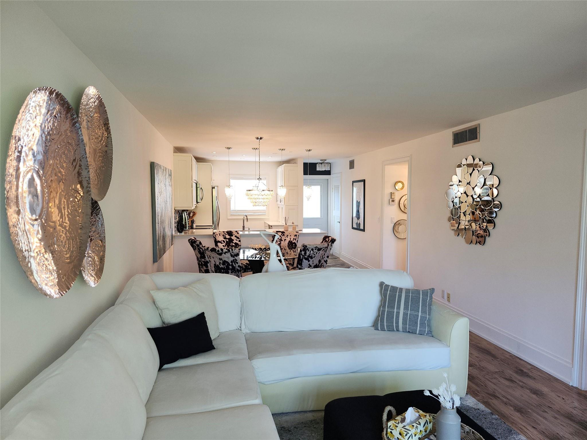301 Cambridge Road, Unit 301 Hollywood, FL 33024 - Photo 12 of 31 a view of a living room and dining room