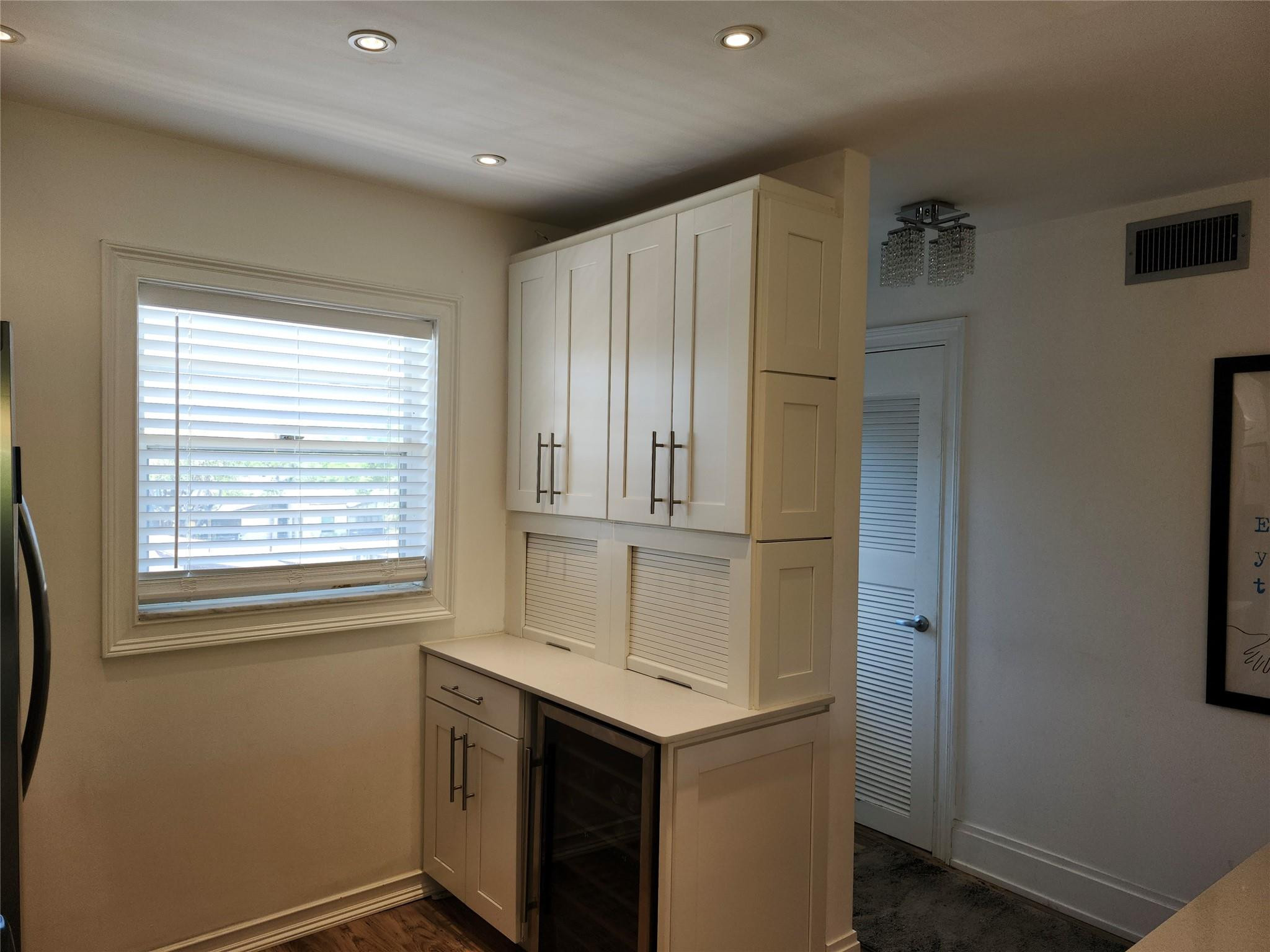 301 Cambridge Road, Unit 301 Hollywood, FL 33024 - Photo 8 of 31 a bathroom with a sink and a mirror