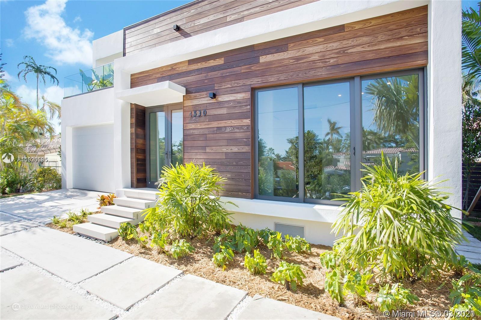 4530 Alton Road Miami Beach, FL 33140 - Photo 11 of 25 a view of a garden with pathway