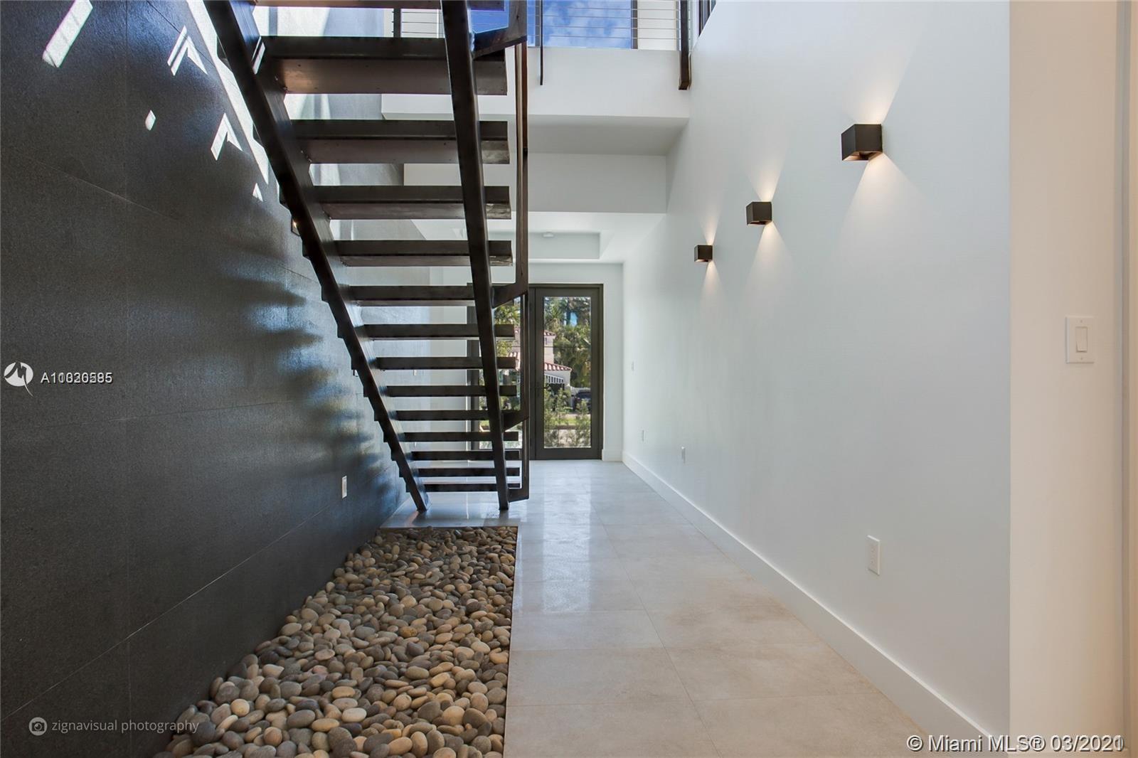 4530 Alton Road Miami Beach, FL 33140 - Photo 19 of 25 a view of entryway with stairs