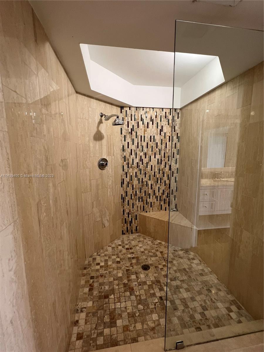 1915 Brickell Avenue, Unit TH16 Miami, FL 33129 - Photo 20 of 36 a bathroom with a shower