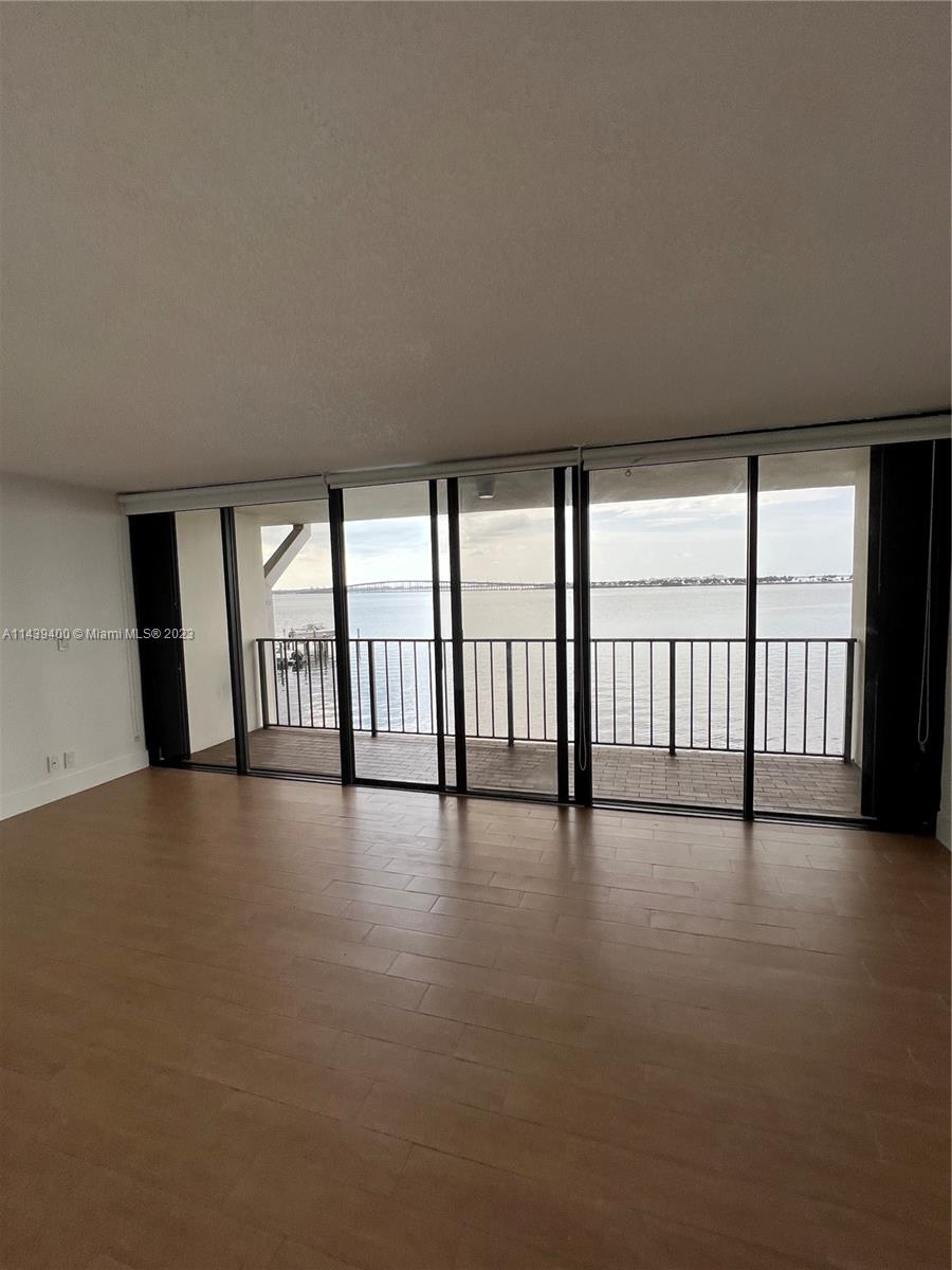 1915 Brickell Avenue, Unit TH16 Miami, FL 33129 - Photo 22 of 36 a view of an empty room with windows and view of an empty room