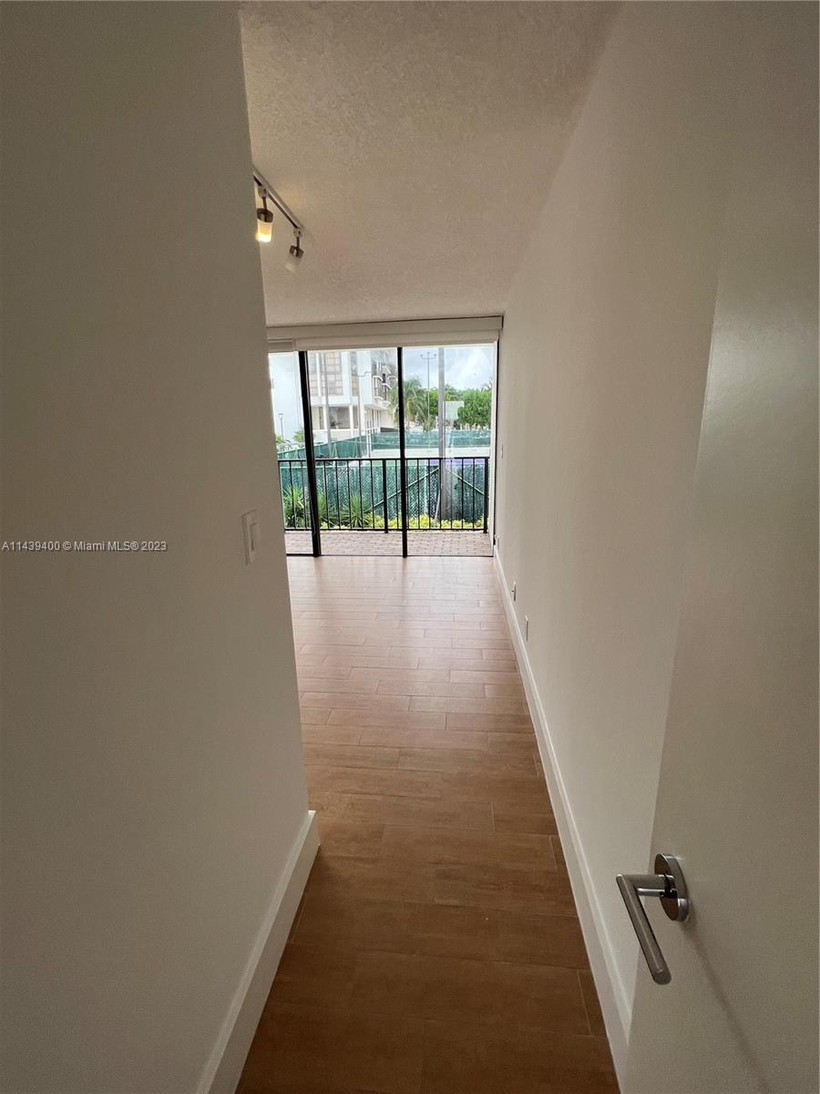1915 Brickell Avenue, Unit TH16 Miami, FL 33129 - Photo 25 of 36 an entryway of a house with a big yard