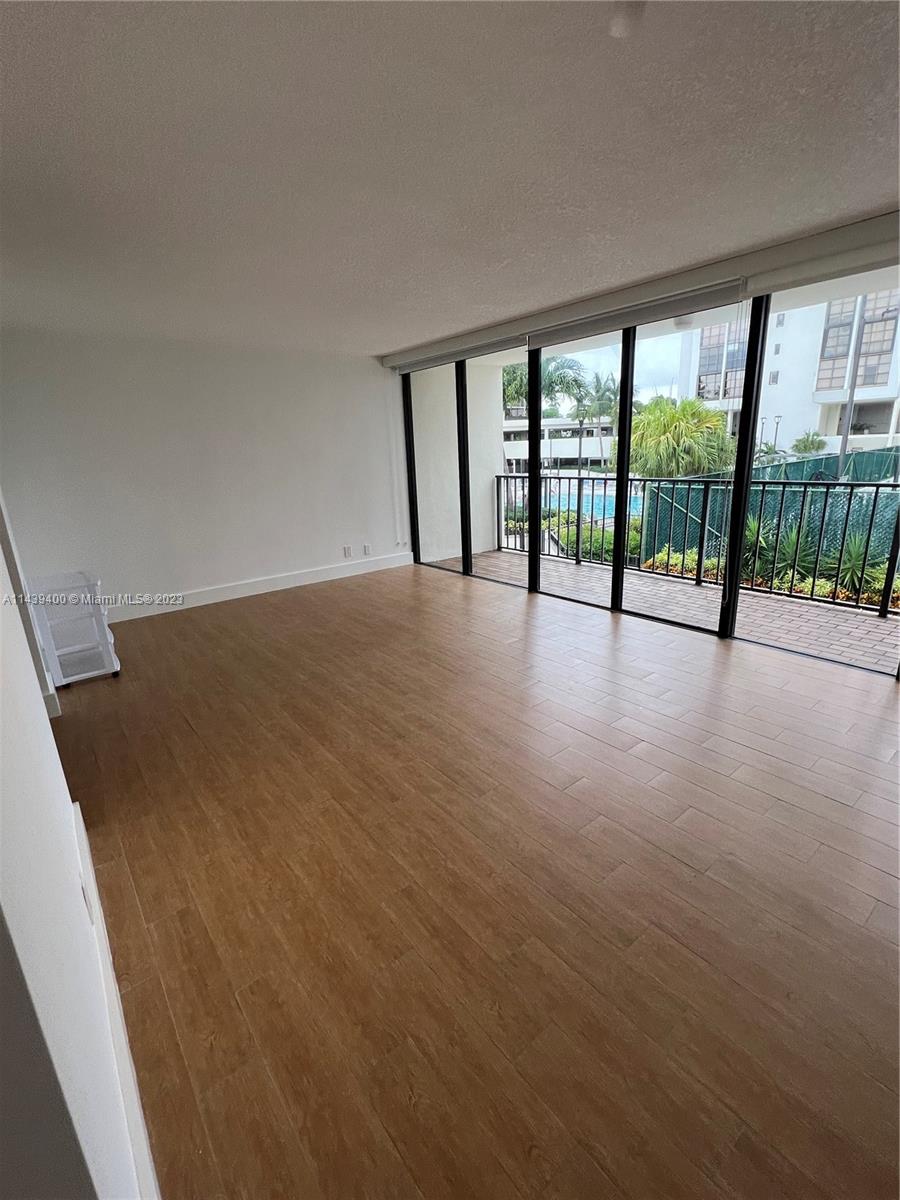 1915 Brickell Avenue, Unit TH16 Miami, FL 33129 - Photo 26 of 36 a view of an empty room with a large window