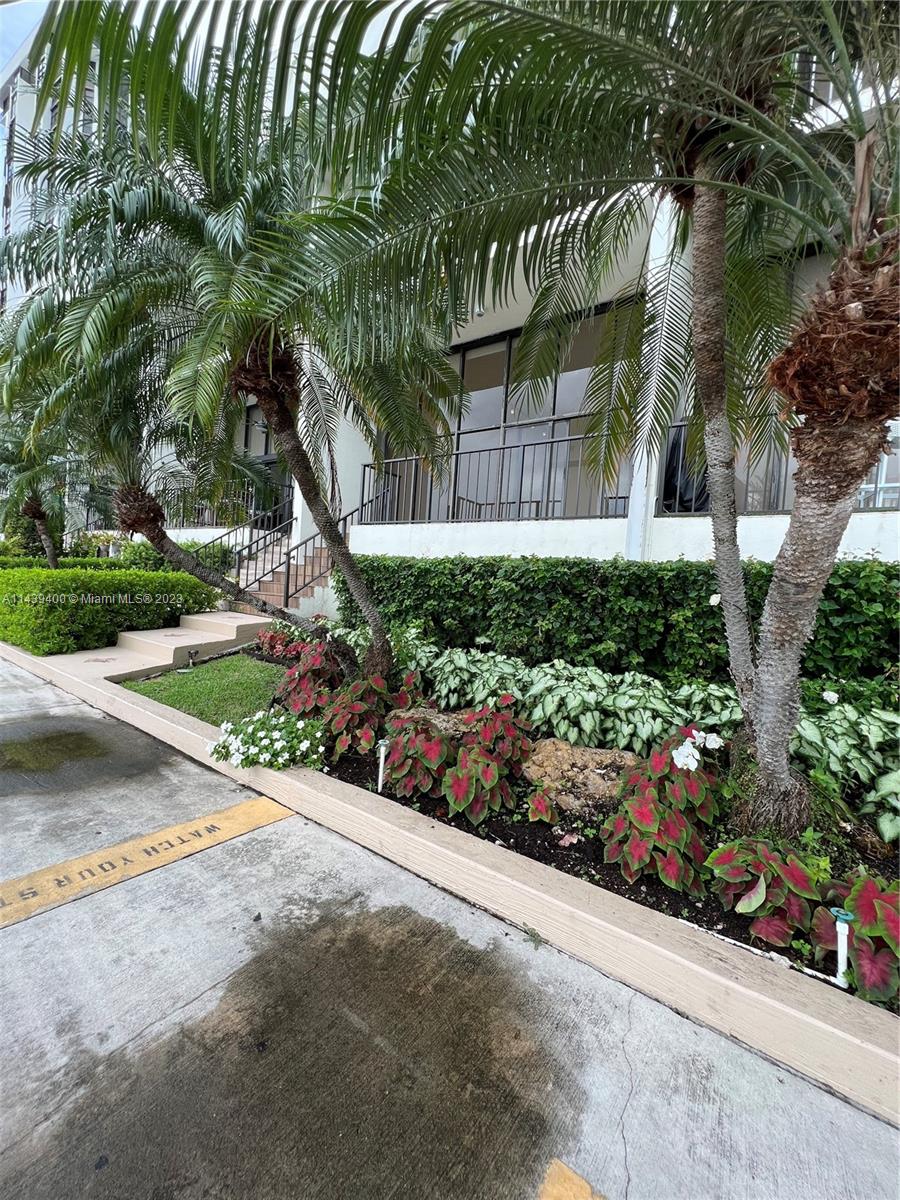 1915 Brickell Avenue, Unit TH16 Miami, FL 33129 - Photo 4 of 36 a view of a chair and table in the garden