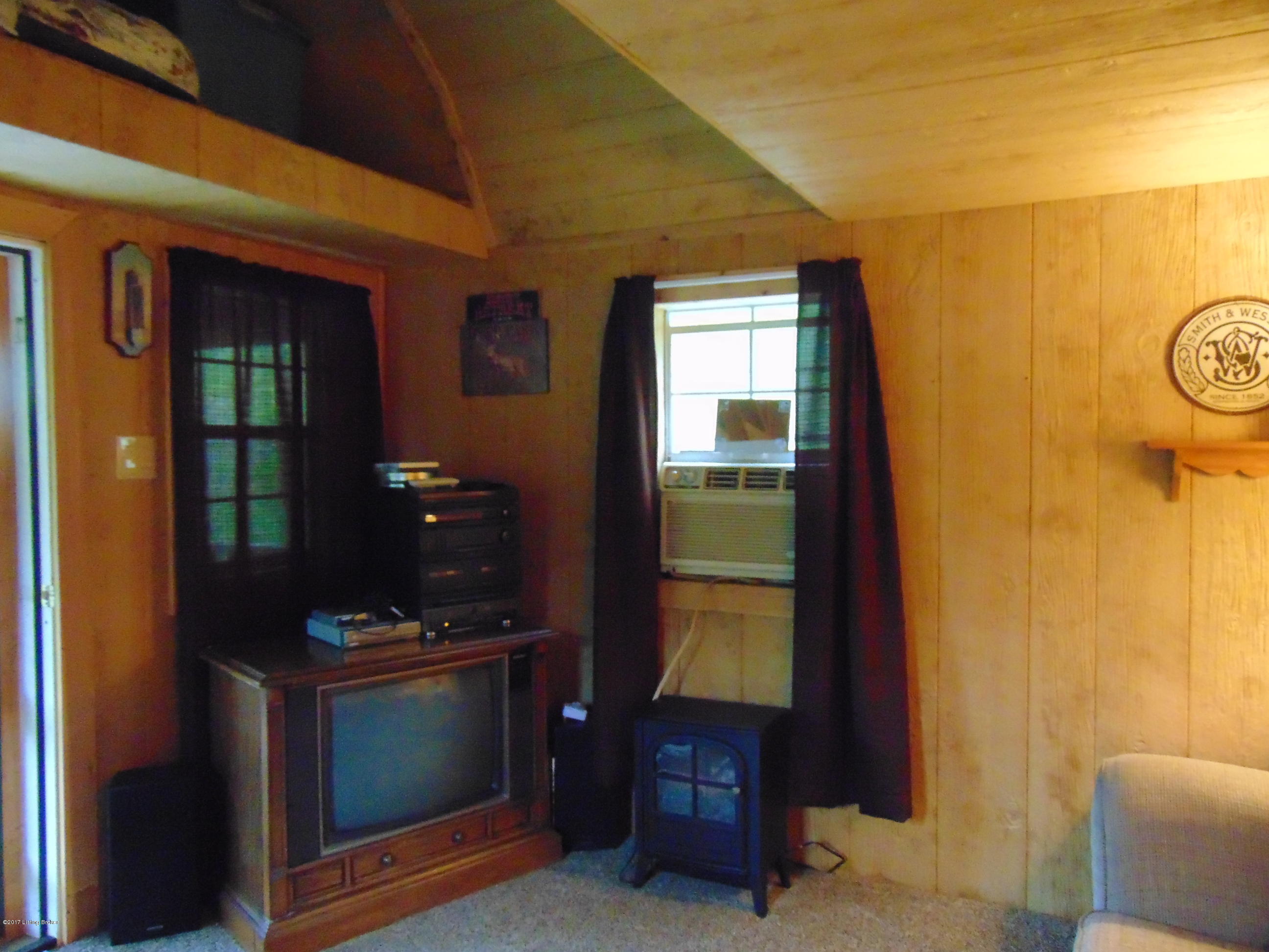 532 West Prong Locust Road Milton, KY 40045 - Photo 6 of 24 This is showing the window air conditioning and the small electric space heater perfect for a cabin