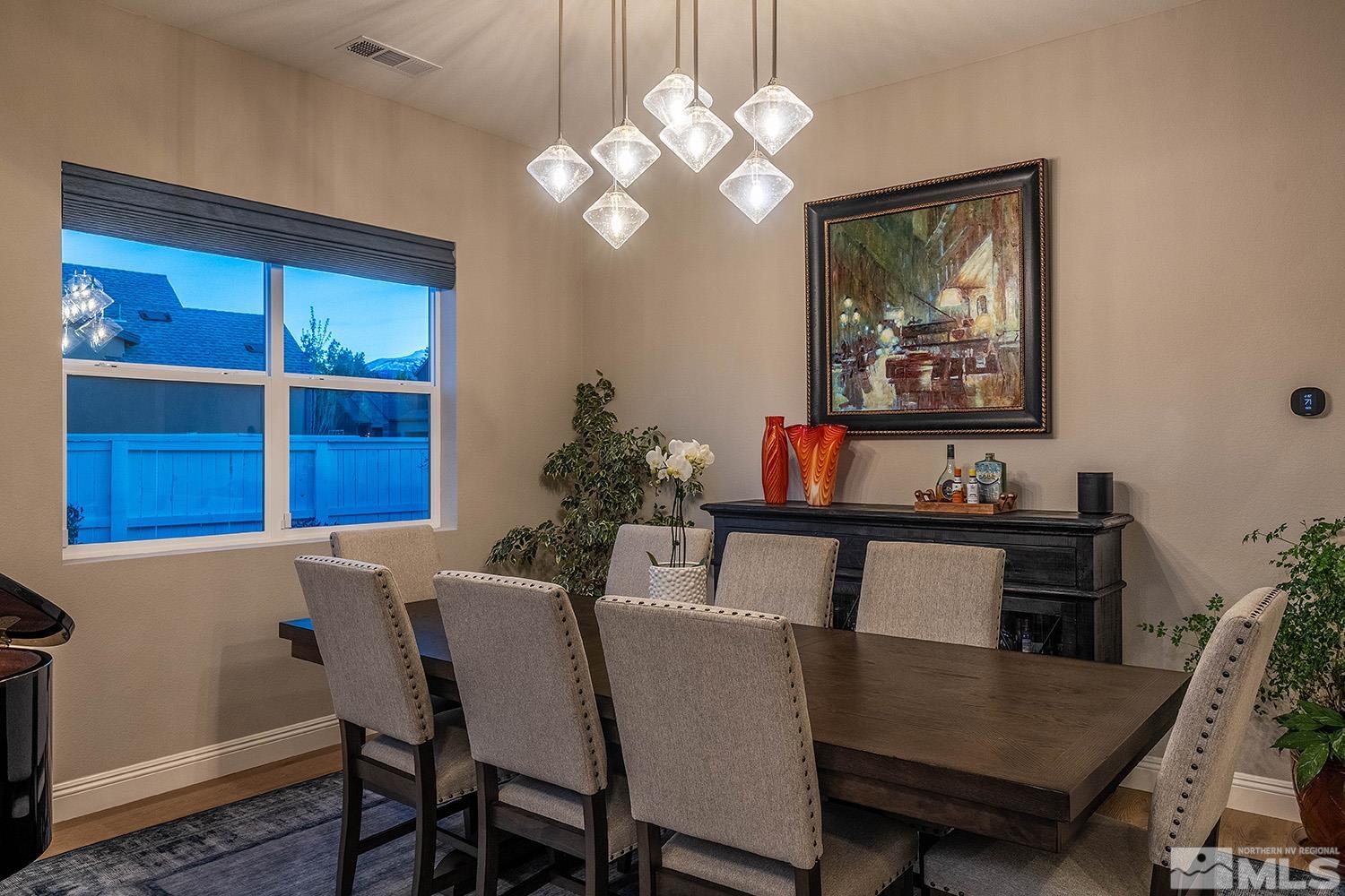 5414 Cremello Way Reno, NV 89511 - Photo 20 of 40 a view of a dining room with furniture and window