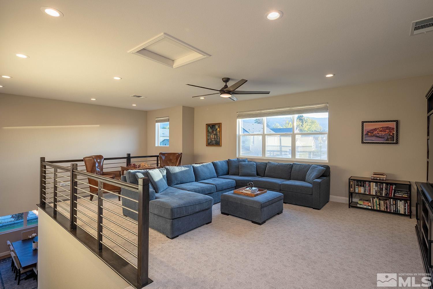5414 Cremello Way Reno, NV 89511 - Photo 29 of 40 a living room with furniture and a window